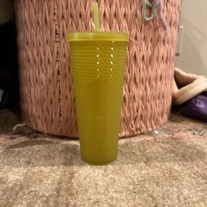 Glow in the dark neon green textured Starbucks cup